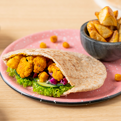 Pita pocket con vegetales al curry Pita pocket con vegetales al curry